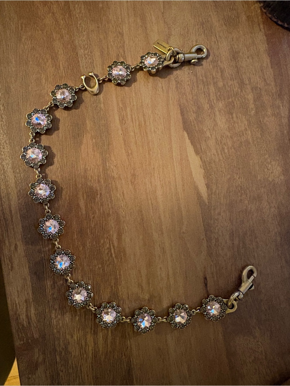 Coach Gold-Tone Bracelet with Pink Iridescent Crystals